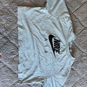 it is a baby blue Nike shirt the fabric quality is soft